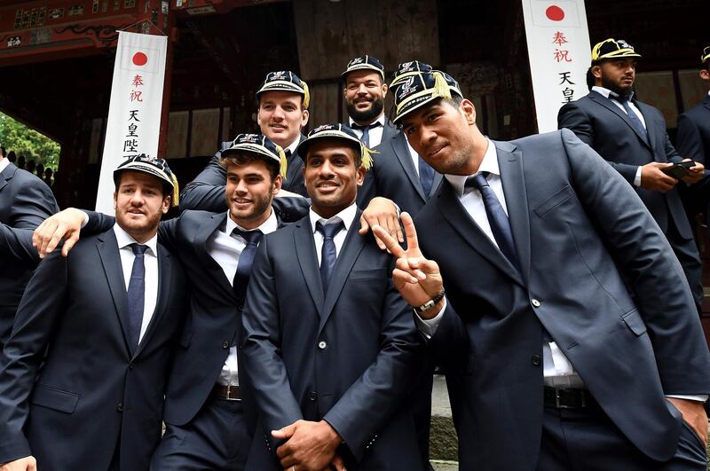 France's fly-half Camille Lopez, winger Damian Penaud, flanker Arthur Iturria, centre Wesley Fofana, prop Rabah Slimani and lock Sebastien Vahaamahina pose at the Kitaguchi Hongu Fuji Sengen Shrine following the official welcoming ceremony in Fujiyoshida. AFP