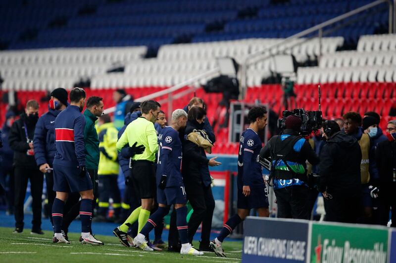 Players of Paris Saint Germain leave the pitch. PA