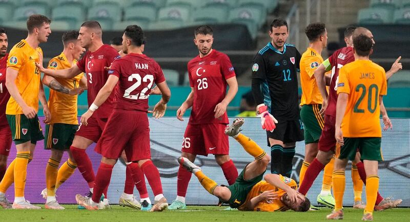 Players from both sides clash in a later scuffle. PA