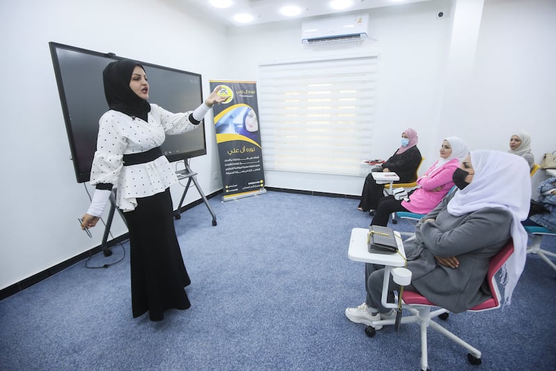Noura, 29, instructs her pupil in driving theory. 'I established the driving centre seven years ago,' she says. 'I only managed to prove myself in the past year in terms of societal and family challenges.'