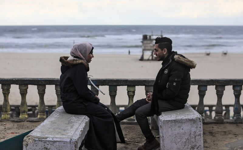 Palestinian groom Ahmed al-Ketnani, 27, sits with his 19-year-old fiancee Sara along the beach in Gaza City, after having decided to postpone their nuptials due to the COVID-19 coronavirus disease pandemic. Gazans may be trying to make light of coronavirus on social media, comparing lockdowns to the Israeli blockade, but fears are growing of a disastrous outbreak in the Palestinian territory. With movement in and out of the territory severely restricted since long before the pandemic emerged, the Gaza Strip is perhaps one of the few places on earth with a chance of staying virus-free. AFP