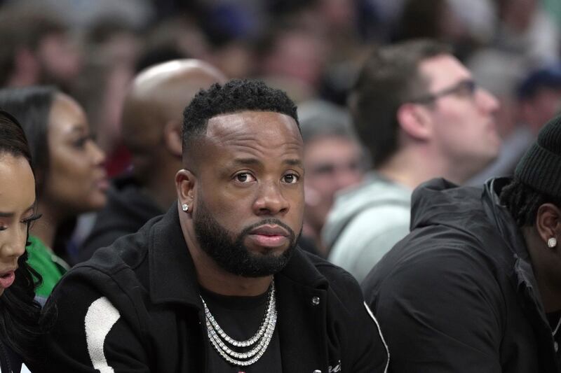 Rapper Yo Gotti watches the game between Memphis Grizzlies and Cleveland Cavaliers on Wednesday in Memphis. AP