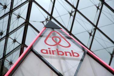 The Airbnb logo under the glass Pyramid of the Louvre museum in Paris, France. Reuters