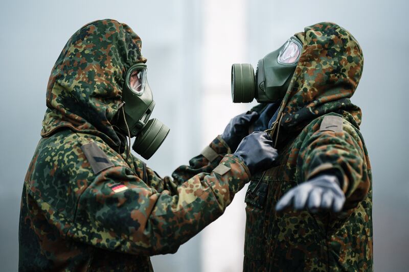 Soldiers on an exercise wearing gas masks during a visit by Defence Minister Boris Pistorius in Mahlwinkel, Germany.  EPA