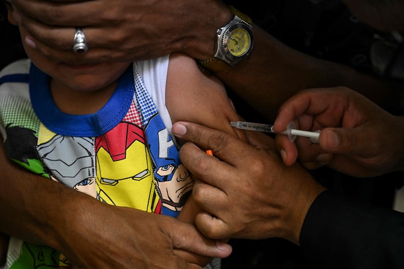 Measles, caused by a highly contagious virus, is an airborne disease that can result in severe complications and death. All photos: AFP