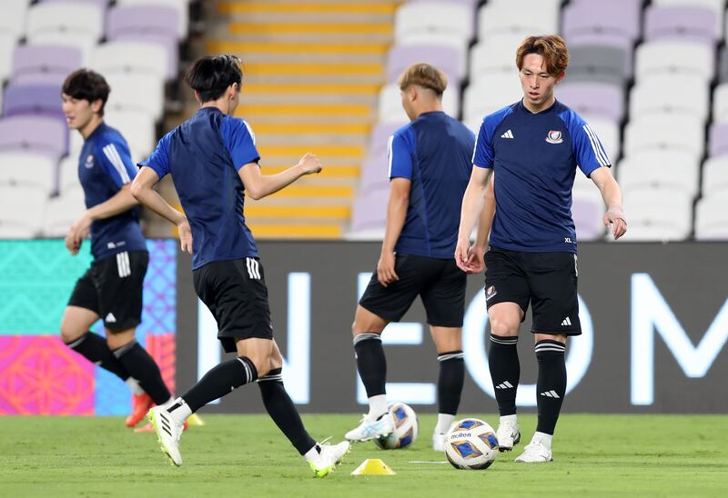 Yokohama players prepare to take on Al Ain at the Hazza Bin Zayed Stadium