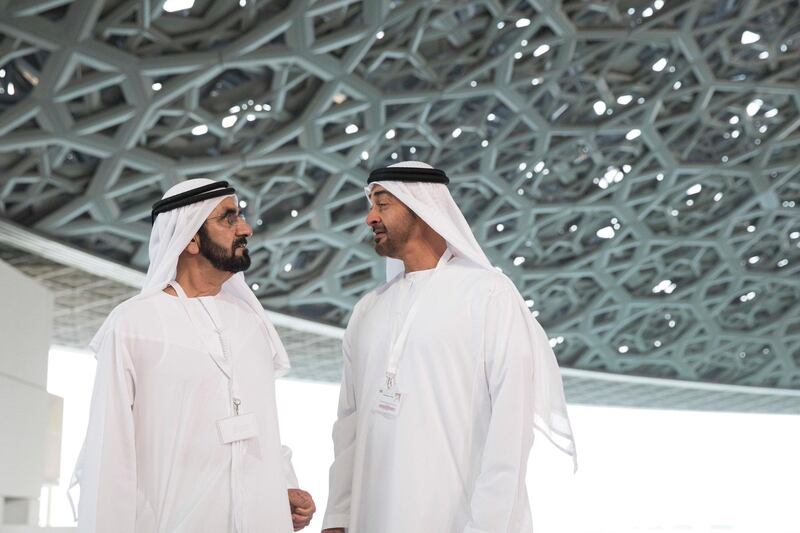 SAADIYAT ISLAND, ABU DHABI, UNITED ARAB EMIRATES - September 11, 2017: HH Sheikh Mohamed bin Zayed Al Nahyan, Crown Prince of Abu Dhabi and Deputy Supreme Commander of the UAE Armed Forces (R), and HH Sheikh Mohamed bin Rashid Al Maktoum, Vice-President, Prime Minister of the UAE, Ruler of Dubai and Minister of Defence (L), stand for a photograph while touring the newly constructed Louvre Abu Dhabi. 
( Ryan Carter / Crown Prince Court - Abu Dhabi )
---