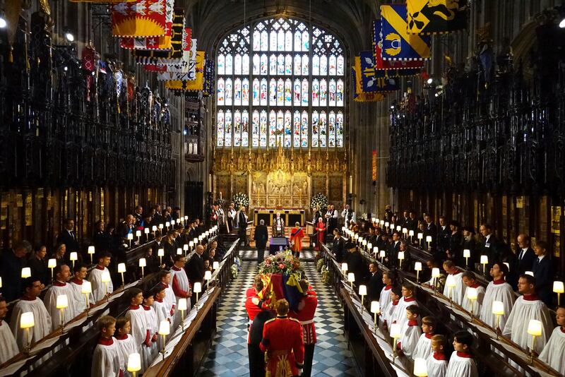 The coffin is carried into St George's Chapel for the Committal Service, in Windsor Castle. AP