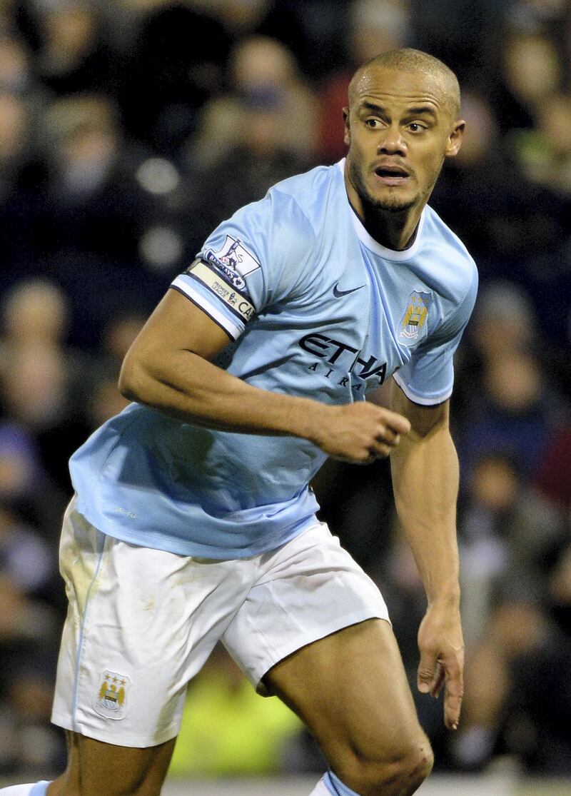 WEST BROMWICH, ENGLAND - DECEMBER 04:  Vincent Kompany of Manchester City in action during the Barclays Premier League match between West Bromwich Albion and Manchester City at The Hawthorns on December 4, 2013 in West Bromwich, England.  (Photo by Ross Kinnaird/Getty Images)