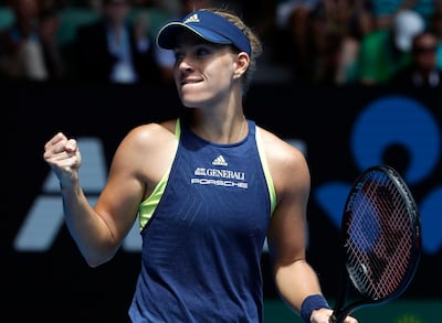 Germany's Angelique Kerber celebrates after defeating United States' Madison Keys in their quarterfinal at the Australian Open tennis championships in Melbourne, Australia, Wednesday, Jan. 24, 2018. (AP Photo/Ng Han Guan)