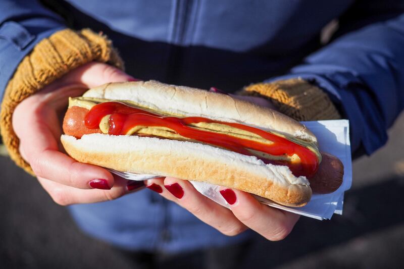 University of Michigan researchers say hot dogs are one of the biggest unhealthy culprits  as they take 36 minutes away from a person's lifespan. Unsplash