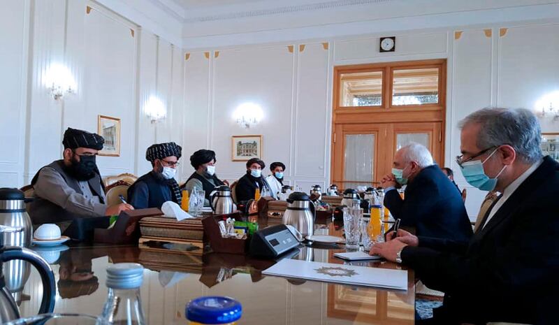Iran's Foreign Minister Mohammad Javad Zarif, second right, meets with a Taliban delegation in Tehran, Iran on January 31, 2021. Tasnim News Agency