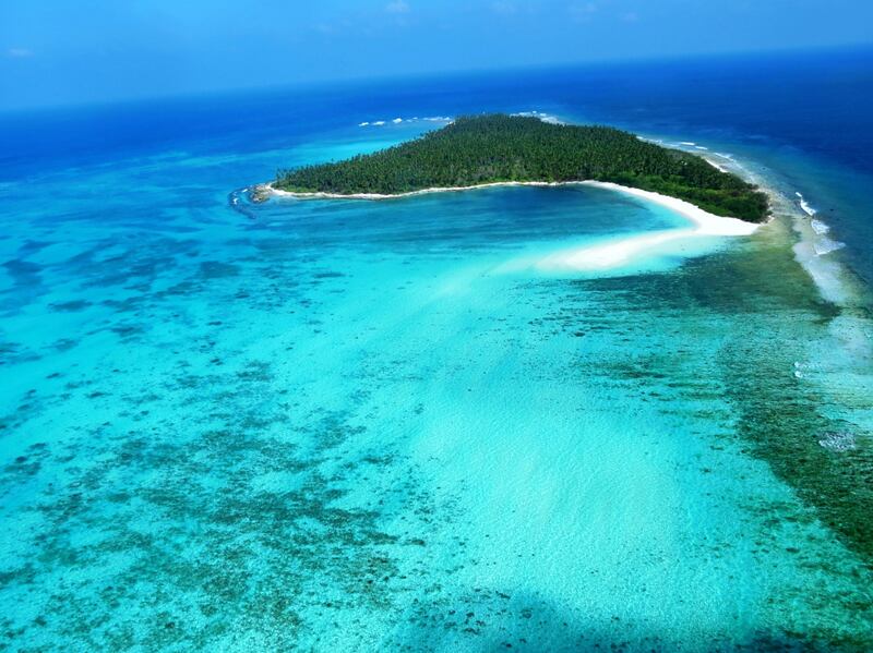 Visitors to Lakshadweep can go sailing or scuba diving surrounded by palm trees, beaches and lagoons. Unsplash / Anuj Chauhans