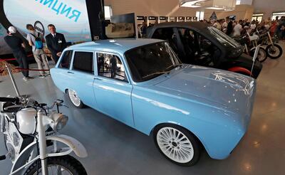 epa06969090 A blue prototype of CV-1 electric car manufactured by Concern Kalashnikov, Russian producer of a wide range of precision weapons, is exhibited during ARMY 2018 International Military and Technical Forum in the Patriot Park in Alabino, Moscow region, Russia, 24 August 2018.  The car has driving range of 350 km between battery pack recharges and it accelerates from 0 to 100 km/h in 6 seconds. The presented retro-looking concept which is constructed on the basis of a Soviet-era hatchback IZh-21252 Kombi is used  as a stand for testing of developed complex systems.  EPA/SERGEI ILNITSKY