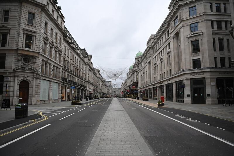 An unusually quiet Regents Street on Boxing Day in London. Boxing Day is traditionally a very busy time for retailers when they expect large footfall from shoppers due to discounts and sales. EPA