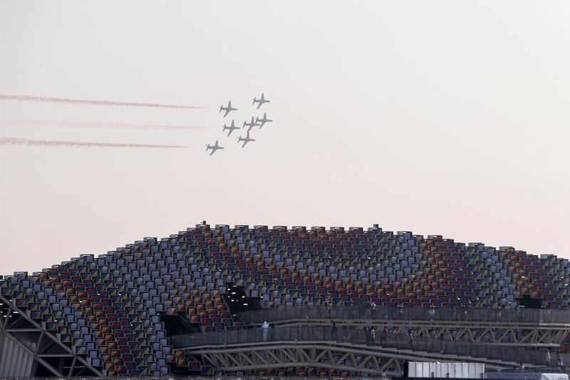 Al Fursan aerobatic display team perform fly over South Korea Pavilion in the late afternoon at Dubai Expo. Khushnum Bhandari/ The National