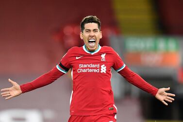 Liverpool's Roberto Firmino celebrates after scoring the winner against Tottenham at Anfield. AP