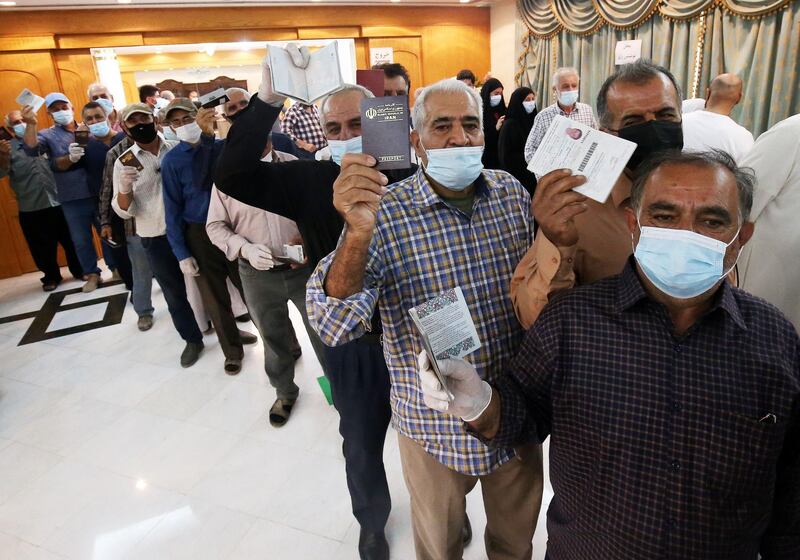 Iranians queue to vote in the the Islamic republic's presidential election at the Iranian embassy in Kuwait City. AFP