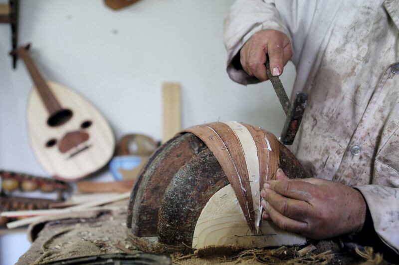 Mandatory Credit: Photo by Mohamed Messara/Epa/REX/Shutterstock (7752750g)
Tunisian Musical Instrument Manufacturer Abdelatif Belasfer 48 Prepares a Lute at His Workshop in Village Artist Denden in Tunis Tunisia 08 January 2013 Abdelatif Has Been Making Instruments Since 30 Years He Learned the Trade From His Father and Belonged to the Third Generation Tunisia Tunis
Tunisia Musical Instrument Manufacturer - Jan 2013

