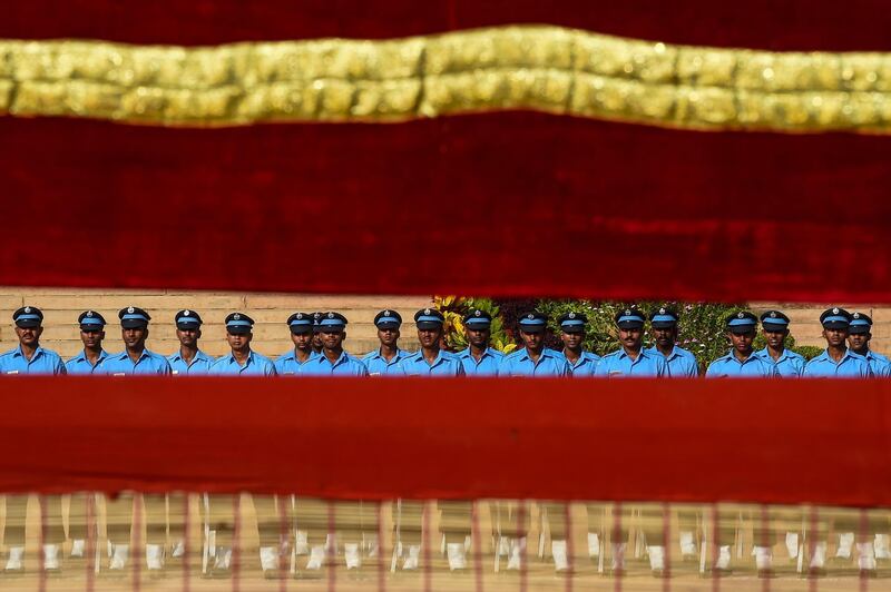 Soldiers from the Indian army stand at attention during a ceremonial reception for visiting Uzbekistan's President Shavkat Mirziyoyev at the presidential palace in New Delhi. Chandan Khanna/AFP