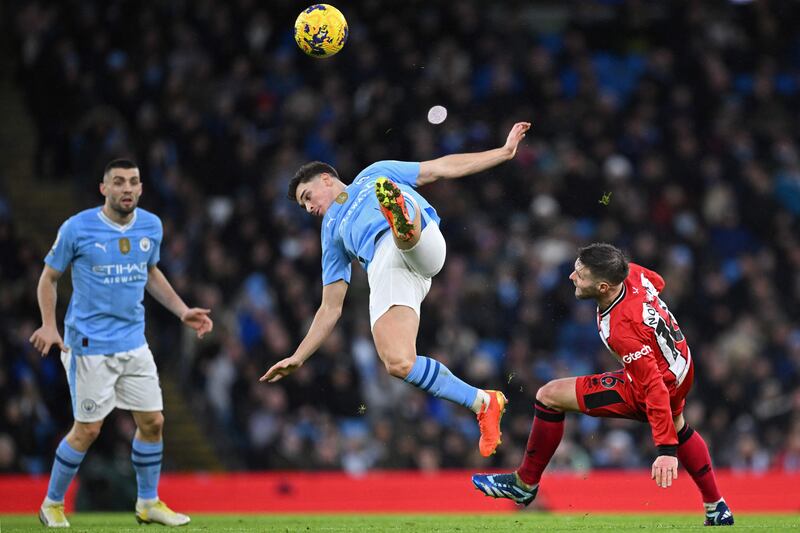Early left-footed chance from outside the box flashed just wide. Close-range finish for City's second. AFP
