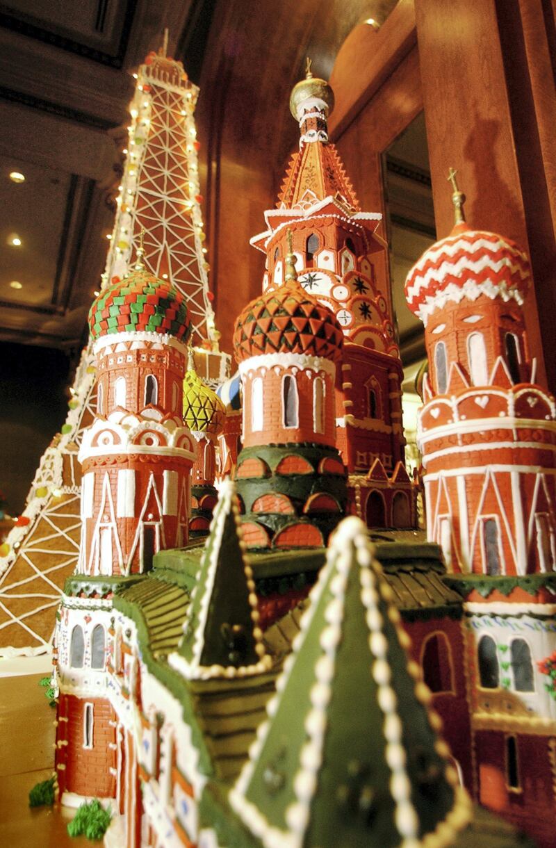 SAN DIEGO, CA - DECEMBER 6:  A gingerbread replica of St. Basil's Cathedral in Russia, with a replica of the Eiffel Tower in the background, is displayed in the lobby of the U.S. Grant Hotel December 6, 2002 in San Diego, California.  The structure was part of the Gingerbread City 2002 contest, which raised money for the Epilepsy Foundation of San Diego County and were designed by local chefs, designers and artists. This year's theme was "Architecture Through the Ages" and featured a seven-foot Eiffel Tower, Egyptian Pyramids, a replica of the Chrystler Building, along with other structures.  (Photo by Sandy Huffaker/Getty Images) 