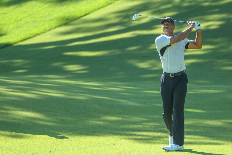 Tiger Woods plays an approach shot on the 13th hole during a practice round prior to the start of the 2022 PGA Championship. AFP
