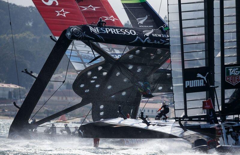 Emirates Team New Zealand nearly capsize while heading for the windward marks during Race 8 of the America's Cup. Abner Kingman / AP Photo