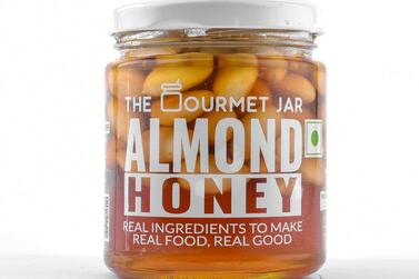 Blanched almonds steeped in organic honey sourced from farms in North India, by The Gourmet Jar and available at Hayawiia  
