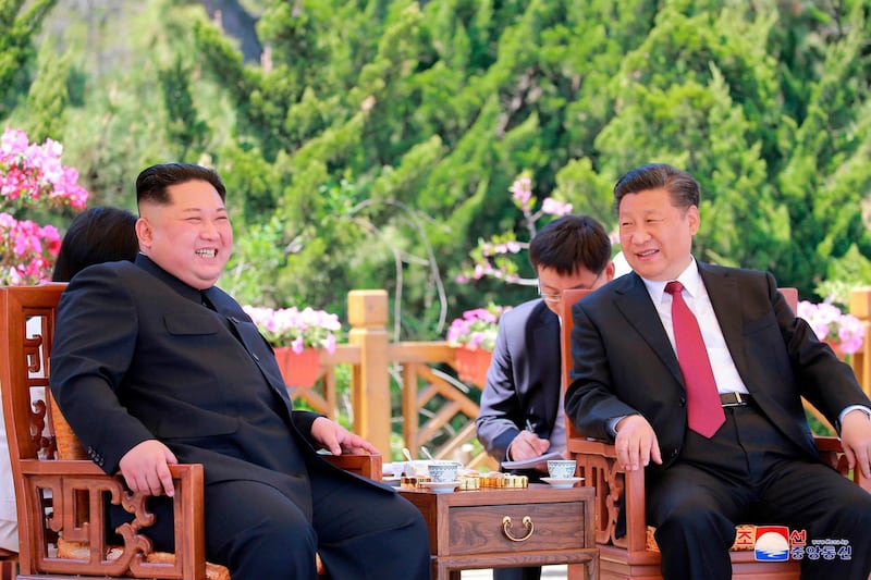 FILE - In this May 8, 2018, file photo provided by the North Korean government, North Korean leader Kim Jong Un, left, meets Chinese President Xi Jinping in Dalian, China.  After a few months of rapprochement, North Korea abruptly called off scheduled high-level talks with South Korea on Wednesday, May 16, 2018,  and warned the U.S. that a planned summit with President Donald Trump could be at risk.  Independent journalists were not given access to cover the event depicted in this image distributed by the North Korean government. The content of this image is as provided and cannot be independently verified. Korean language watermark on image as provided by source reads: "KCNA" which is the abbreviation for Korean Central News Agency. (Korean Central News Agency/Korea News Service via AP, File)