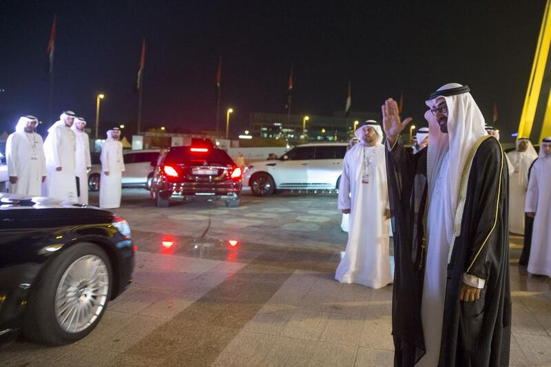 Sheikh Mohammed bin Zayed, Crown Prince of Abu Dhabi Deputy Supreme Commander of the Armed Forces, (R) bids farewell to guests after the 44th UAE National Day celebrations at Zayed Sports City. Mohamed Al Hammadi / Crown Prince Court - Abu Dhabi