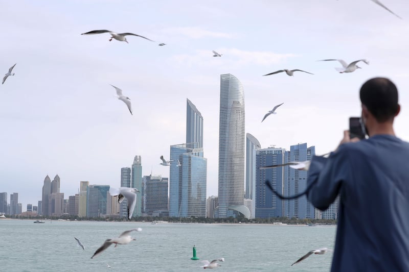 The Abu Dhabi skyline. MUFG says that strong non-oil economic sector activity in the GCC will add to momentum in 2022. Khushnum Bhandari / The National