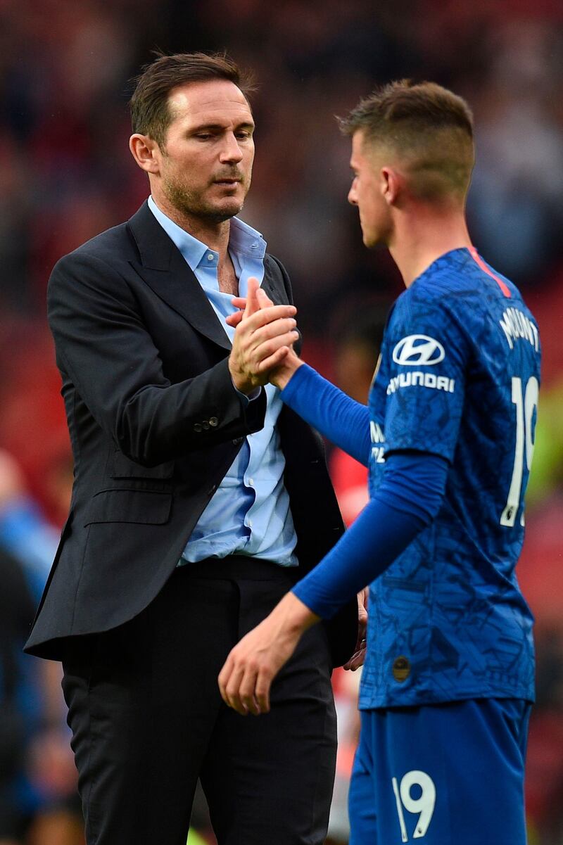 Lampard shakes hands with Mason Mount post-match. AFP