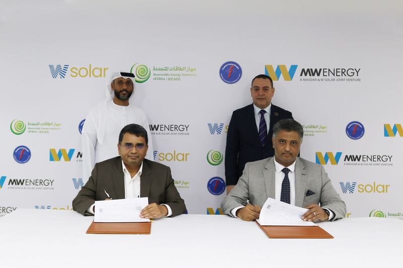 W Solar and Gecol executives at the signing ceremony. Photo: Alpha Dhabi