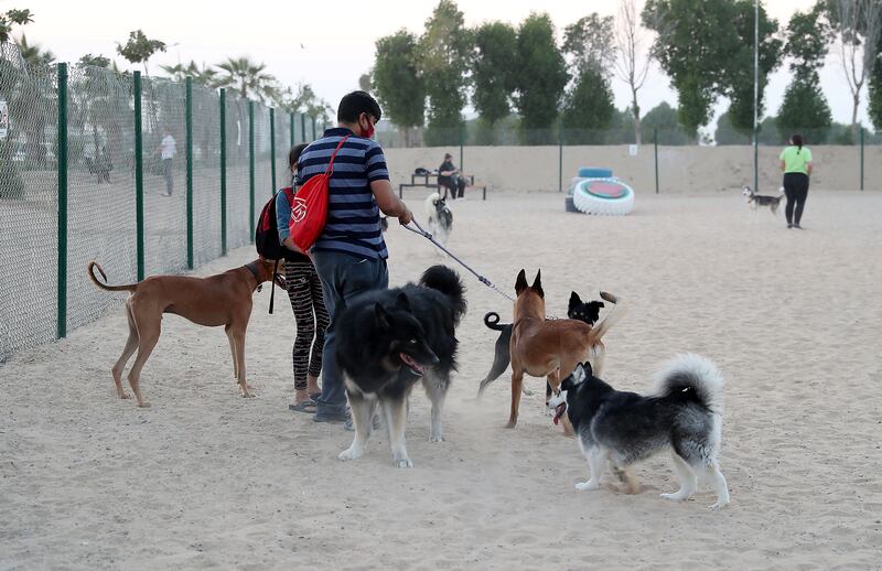 DUBAI, UNITED ARAB EMIRATES, December 10 – People with their dogs after the official opening of Central Bark (dog park) in DAMAC Akoya Oxygen in Dubai. (Pawan Singh / The National) For Lifestyle/Online/Instagram. Story by Hayley  