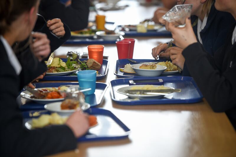 Pupils at a school cafeteria. PA wire