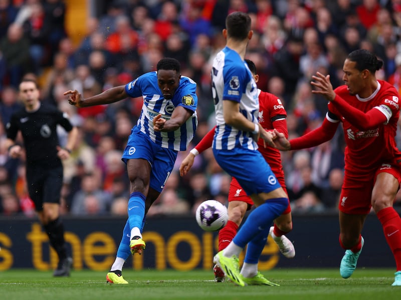 Brighton's Danny Welbeck scores their first goal against Liverpool. Reuters