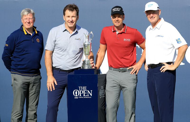 From left: R&A chief executive, Martin Slumbers, Nick Faldo of England, Henrik Stenson of Sweden and Ernie Els of South Africa pose with the Claret Jug on the first hole during a practice round prior to the 146th Open Championship at Royal Birkdale on July 18, 2017 in Southport, England.  Andrew Redington/Getty Images