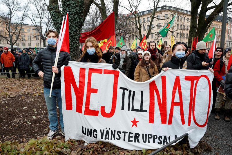 Protesters hold a banner reading 'No to Nato' during a demonstration in Stockholm on Saturday against Sweden's bid to join the alliance. AFP