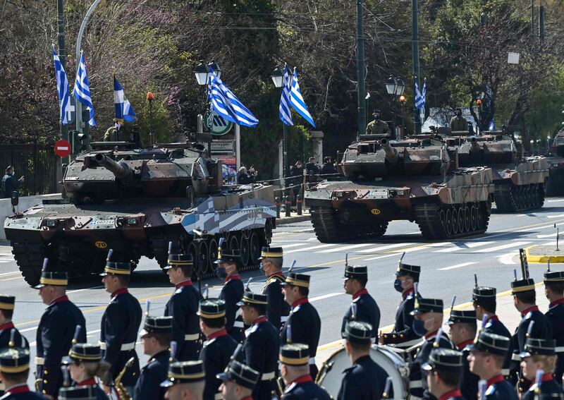 Greek Army tanks take part in an Independence Day Military Parade at Syntagma Square in Athens. AFP