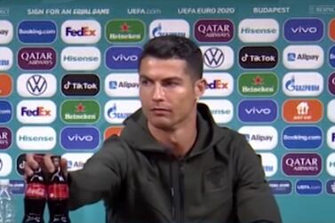 Cristiano Ronaldo snubs Coca-Cola by removing bottles placed at a recent Euro tournament press conference.