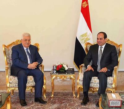 In this Wednesday, Jan. 17, 2018 photo, provided by Egypt's state news agency, MENA, Palestinian President Mahmoud Abbas, left, meets with Egyptian President Abdel-Fattah el-Sissi, in Cairo, Egypt. U.S. Vice President Mike Pence's upcoming visit to the Mideast comes at a time of friction between his administration and the Palestinian leadership, posing a dilemma for Arab hosts Egypt and Jordan on how to safeguard their vital ties with Washington without appearing to ignore Palestinian misgivings.
 (MENA via AP)