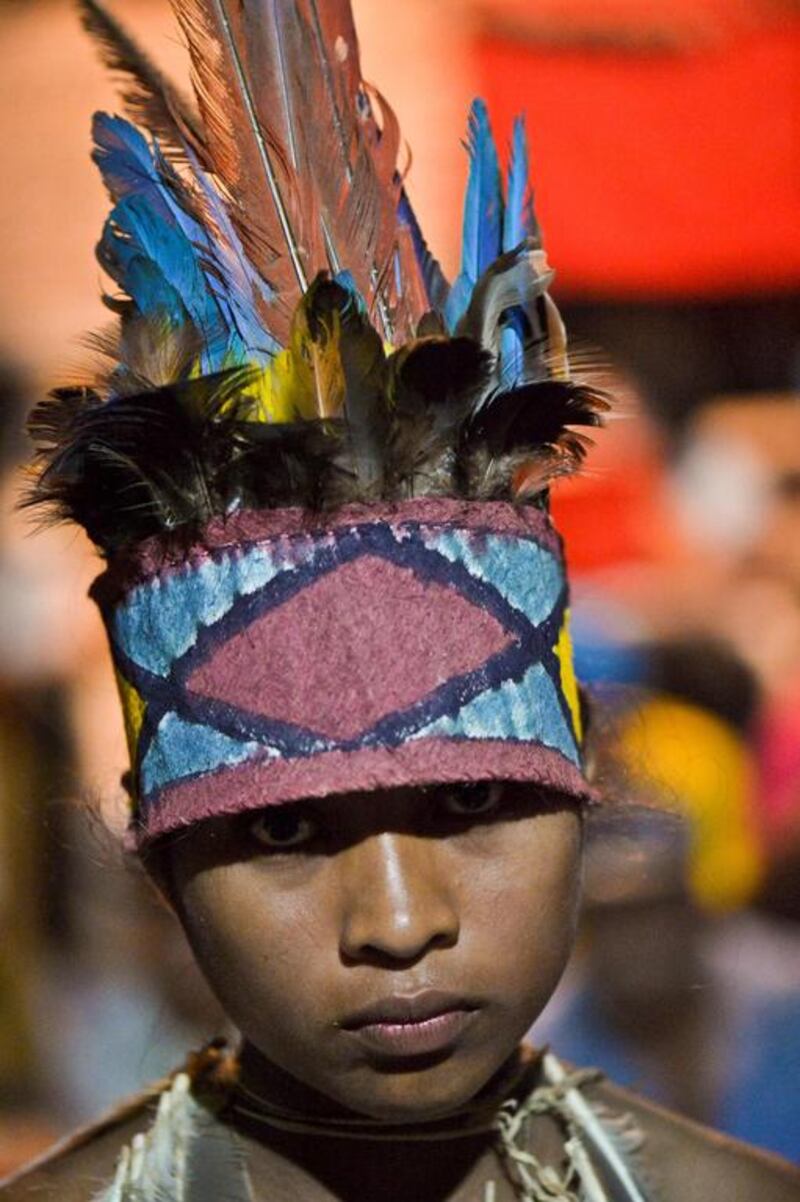 A Colombian indigenous woman of the Tikuna ethnic group takes part in a ritual at the start of the First Intergenerational Summit on Traditional Knowledge and Leaders of the Amazon. Luis Robayo / AFP