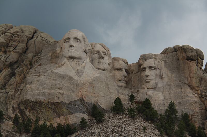 Mount Rushmore National Memorial is a massive sculpture carved into the Black Hills of South Dakota. Completed in 1941 the sculpture's granite faces depict US presidents George Washington, Thomas Jefferson, Theodore Roosevelt and Abraham Lincoln. Photo by Yohan Marion on Unsplash
