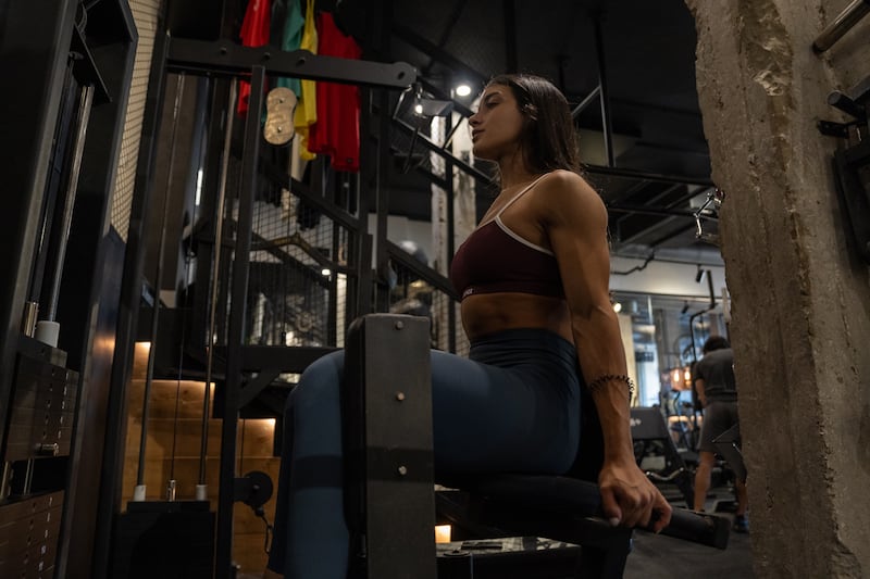 Khairallah trains in the gym after her record-breaking performance at the 2023 International Powerlifting Federation World Junior Championships. Matthew Kynaston / The National