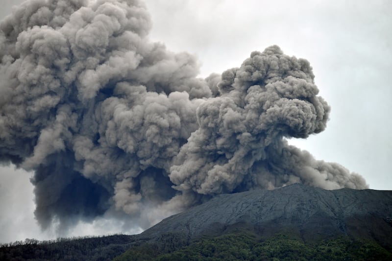 Mount Marapi volcano spews volcanic ash as seen from Nagari Batu Palano in Agam, West Sumatra province, Indonesia, December 4, 2023, in this photo taken by Antara Foto.  Antara Foto/Iggoy el Fitra/via REUTERS ATTENTION EDITORS - THIS IMAGE HAS BEEN SUPPLIED BY A THIRD PARTY.  MANDATORY CREDIT.  INDONESIA OUT.  NO COMMERCIAL OR EDITORIAL SALES IN INDONESIA. 