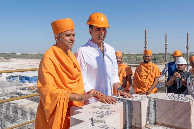 Kumar with Swami Brahmavihari of Baps Swaminarayan Sanstha, the organisation involved in the project