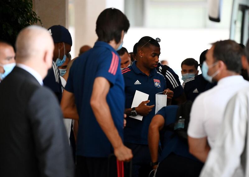 Lyon's players arrive at the team hotel in Cascais near Lisbon ahead of the Champions League quarter-final against Manchester City. AFP