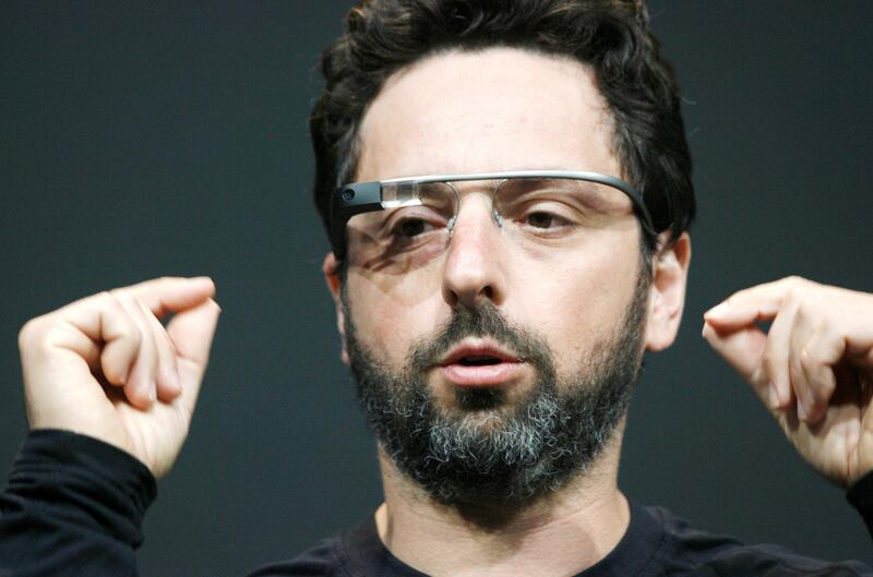 Sergey Brin, co-founder of Google appear at the keynote with the Google Glass to introduce the Google Class Explorer edition during Google's annual developer conference, Google I/O, on June 27, 2012 in San Francisco. AFP PHOTO/Kimihiro Hoshino (Photo by KIMIHIRO HOSHINO / AFP)