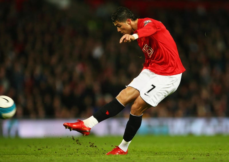 MANCHESTER, UNITED KINGDOM - MARCH 19:  Cristiano Ronaldo of Manchester United scores their second goal from a free kick during the Barclays Premier League match between Manchester United and Bolton Wanderers at Old Trafford on March 19, 2008 in Manchester, England.  (Photo by Alex Livesey/Getty Images)